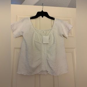 White top size XL.